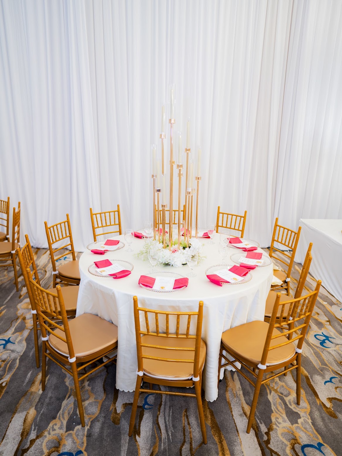 Round table with gold candle stands